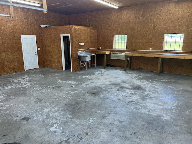 garage with a workshop area and sink