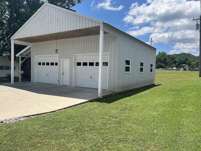 garage featuring a yard