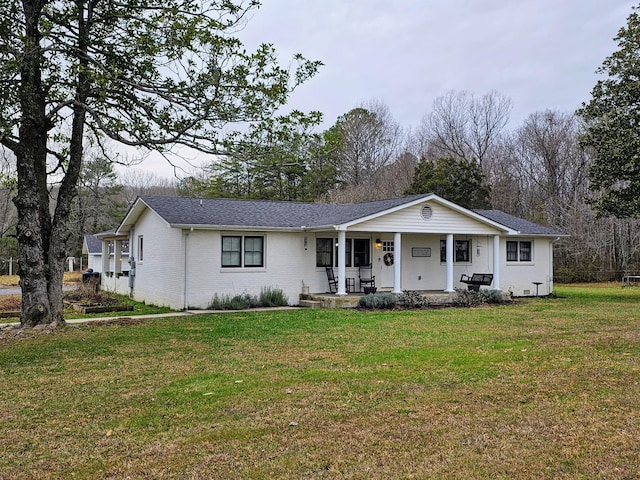 single story home featuring a front lawn and a porch