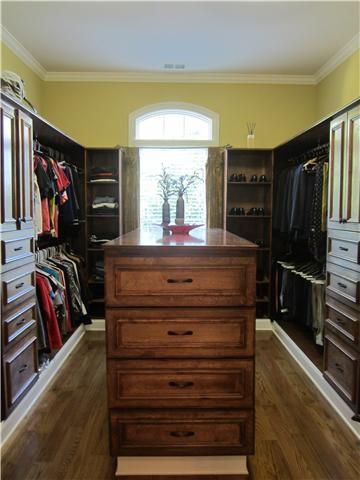 walk in closet featuring dark wood-type flooring