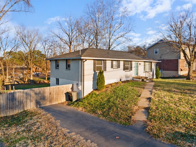 view of front of home with a front yard