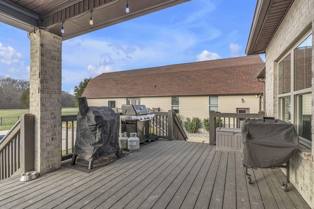 wooden deck with grilling area