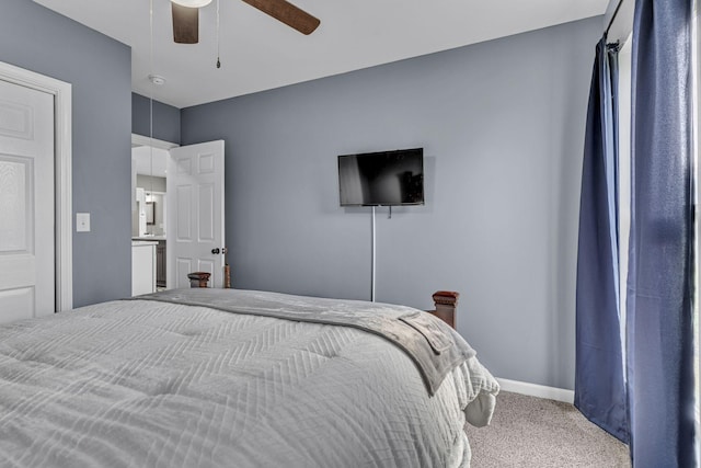 bedroom with ceiling fan and carpet