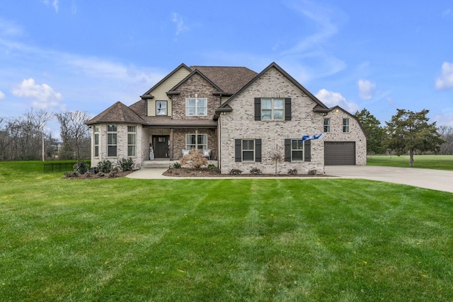 craftsman inspired home featuring a garage and a front yard