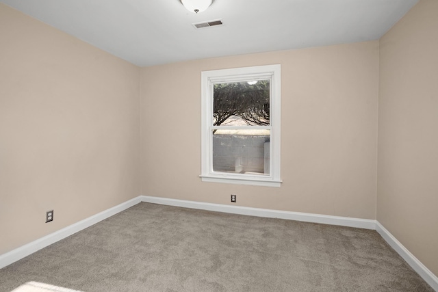 view of carpeted spare room