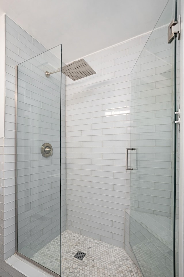 bathroom featuring an enclosed shower