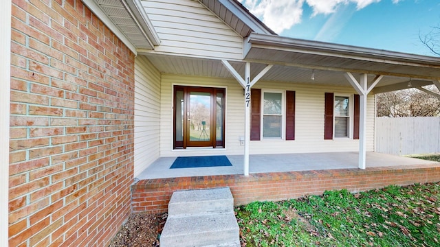 property entrance with a porch