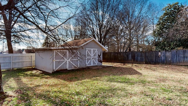 view of outdoor structure with a lawn