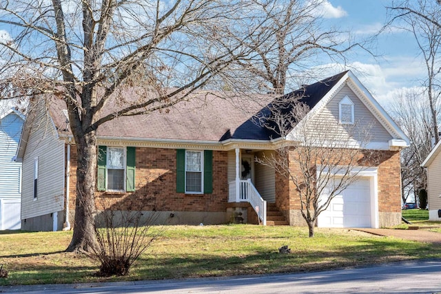 view of front of house with a garage and a front lawn