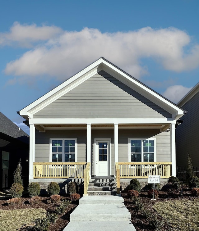 view of front of property featuring covered porch