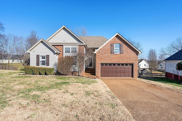 front facade with a front yard and a garage