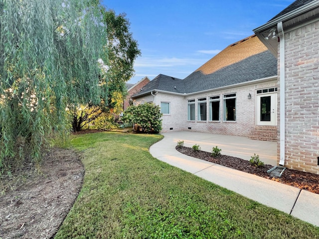 view of yard with a patio area