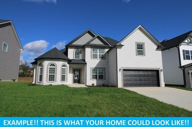 view of front of home with a garage and a front lawn