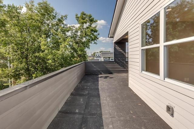 exterior space featuring a balcony