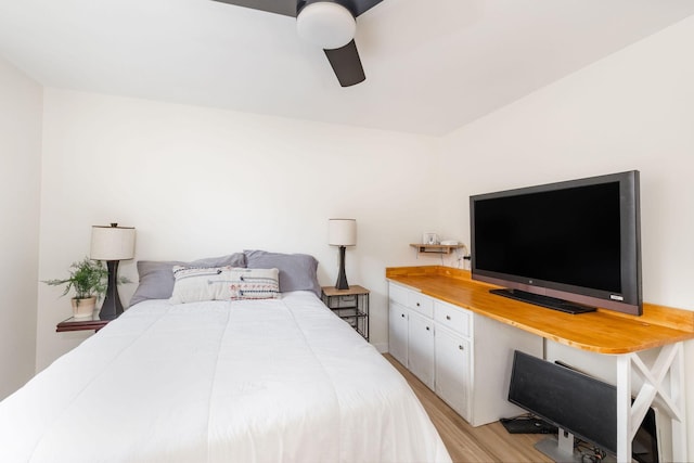 bedroom with ceiling fan and light wood-type flooring