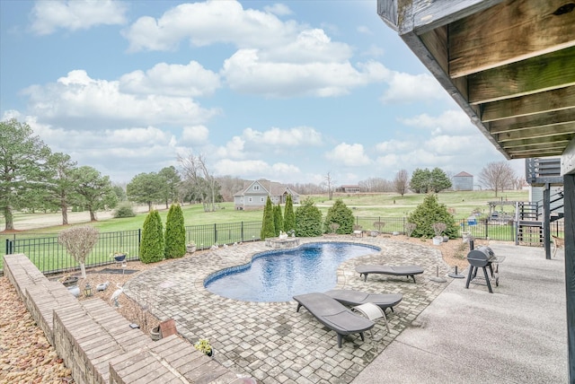 view of swimming pool with a patio