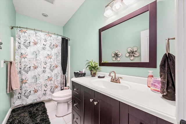 bathroom featuring tile patterned floors, a shower with curtain, vanity, and toilet