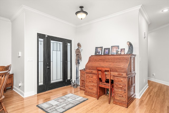 foyer featuring hardwood / wood-style floors and ornamental molding