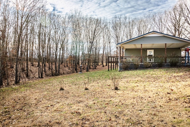 view of yard featuring a porch