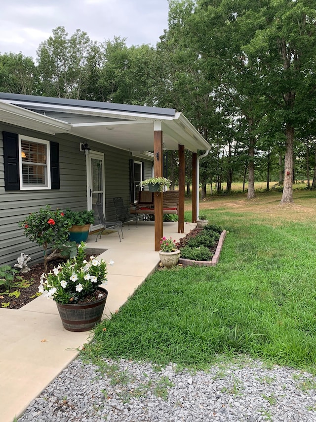 view of yard featuring a porch