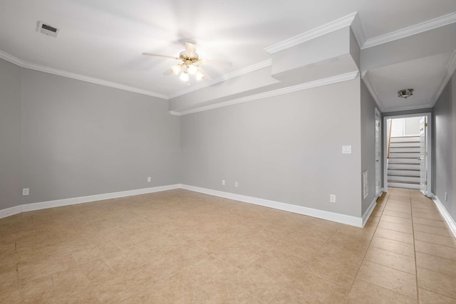 empty room with ceiling fan and crown molding