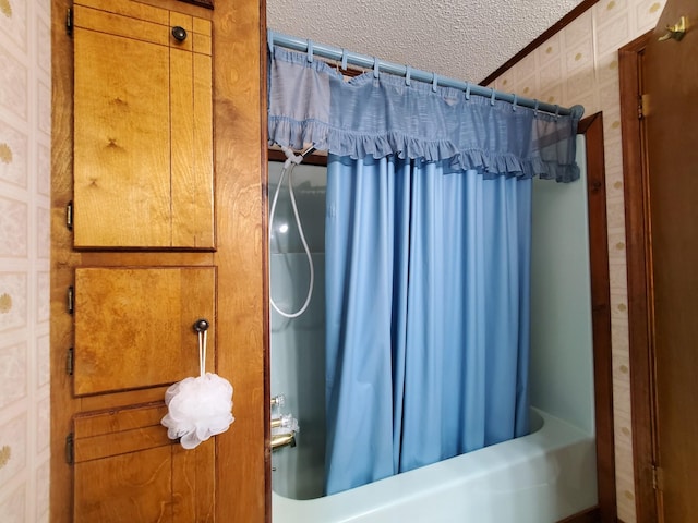 2055 Chisholm Rd, Iron City, TN 38463 - full bathroom with shower / bathtub combination with curtain, a textured ceiling, and wallpapered walls