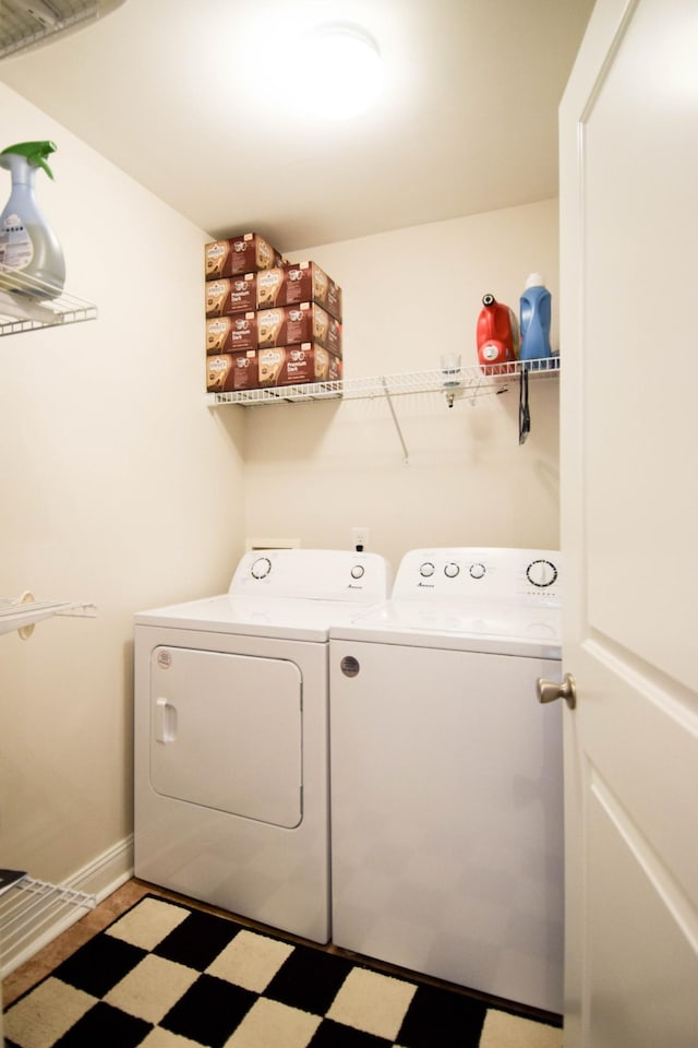 laundry area featuring washer and clothes dryer