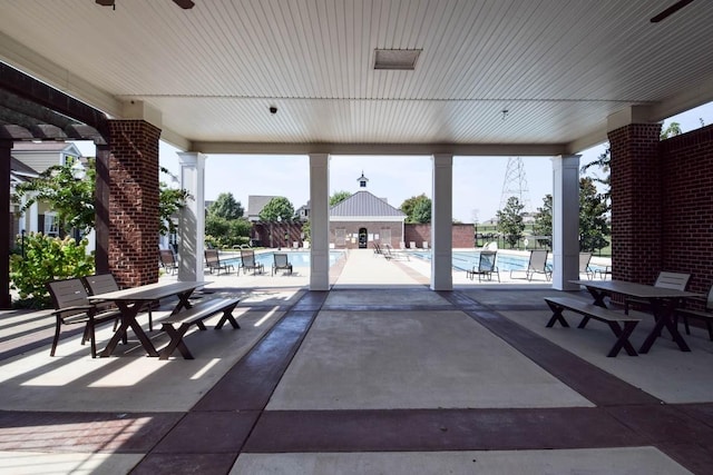 view of patio / terrace featuring a community pool