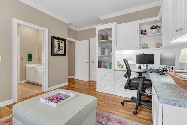 office featuring crown molding and light wood-type flooring