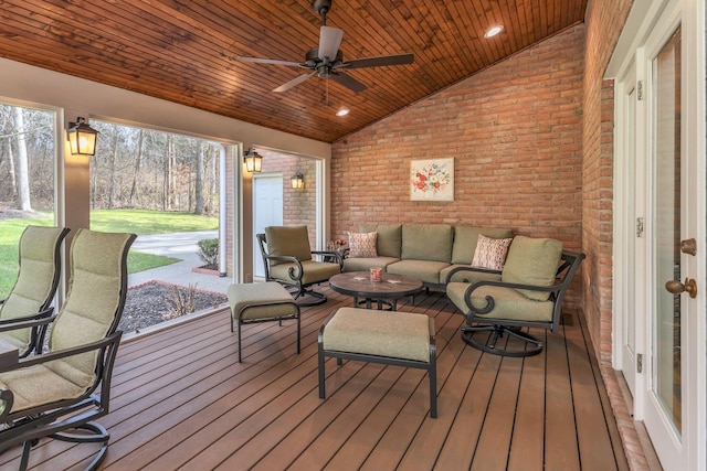 deck with an outdoor hangout area and ceiling fan