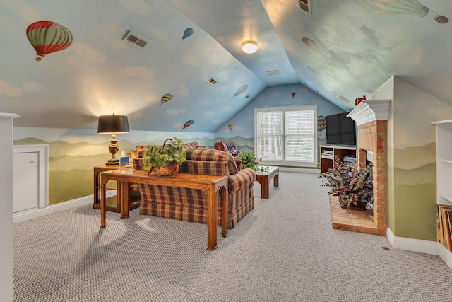 carpeted living room with a fireplace and vaulted ceiling