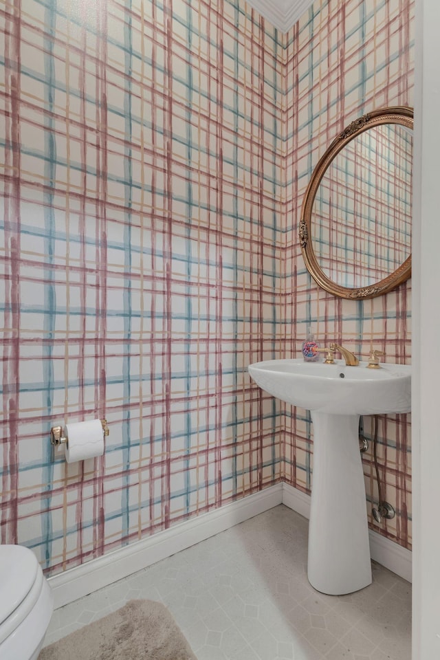 bathroom with tile patterned floors and toilet