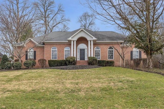 single story home with a front yard