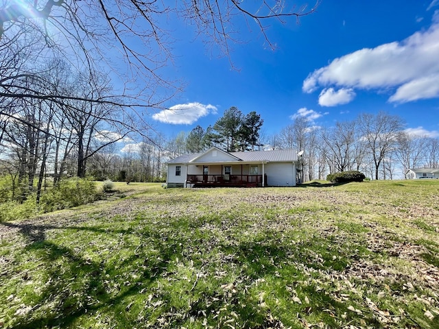 view of front of home with a front yard