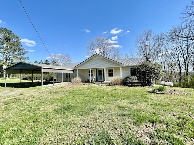 view of front of property with a porch, a carport, and a front lawn