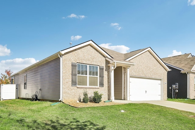 view of front of home with a front yard and a garage