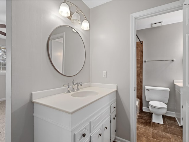 full bathroom with tile patterned floors, shower / washtub combination, vanity, and toilet