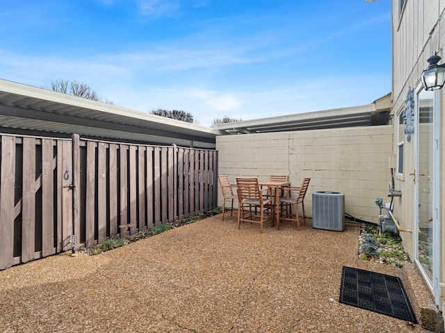 view of patio with cooling unit