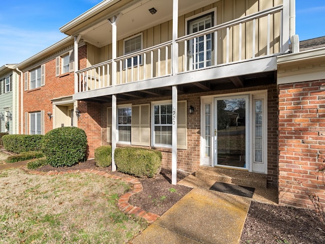 doorway to property featuring a balcony