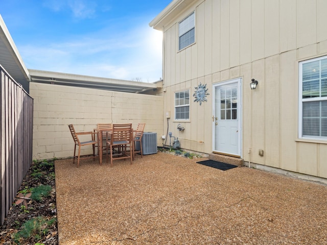 view of yard featuring cooling unit and a patio area