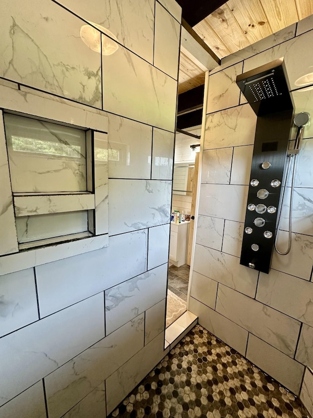 bathroom featuring a shower and wood ceiling