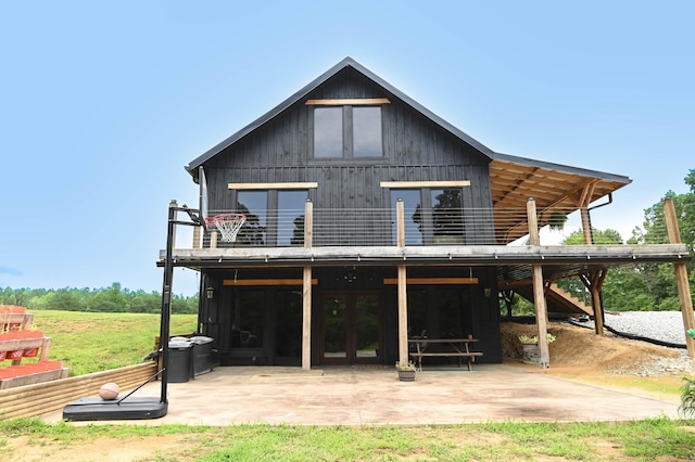 rear view of property with a patio area