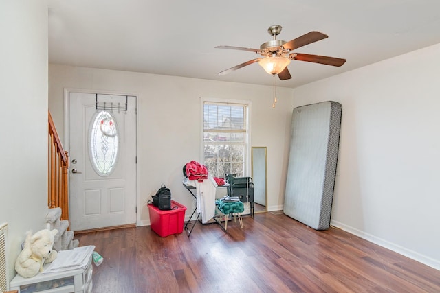 entrance foyer featuring dark hardwood / wood-style floors and ceiling fan