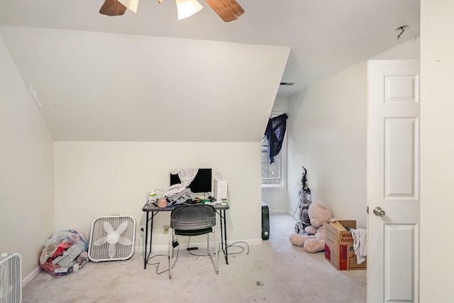 home office with vaulted ceiling and ceiling fan