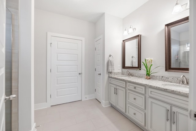 bathroom with vanity and tile patterned floors