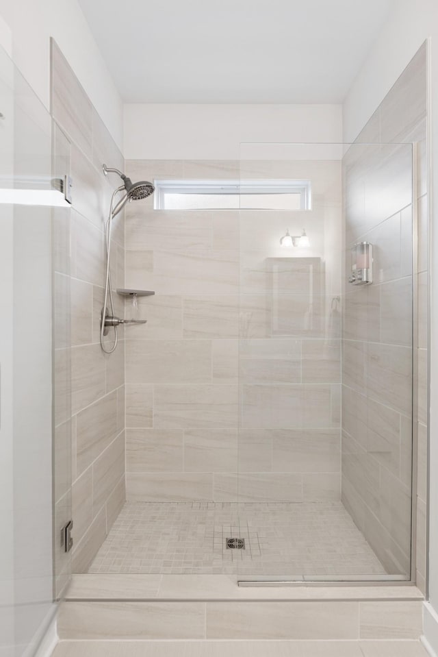 bathroom with an enclosed shower