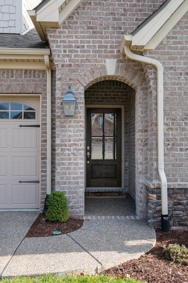 property entrance featuring a garage