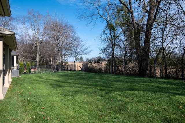 view of yard featuring central AC unit