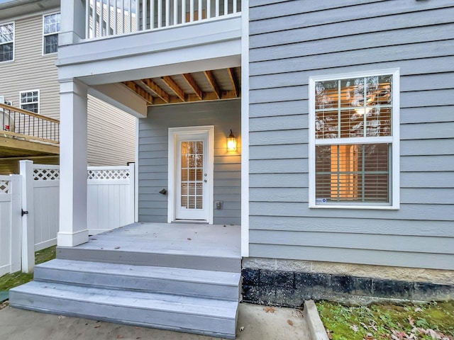 entrance to property featuring a balcony