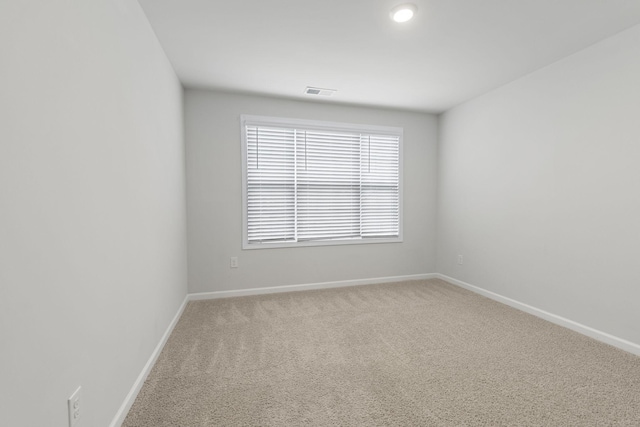 view of carpeted spare room